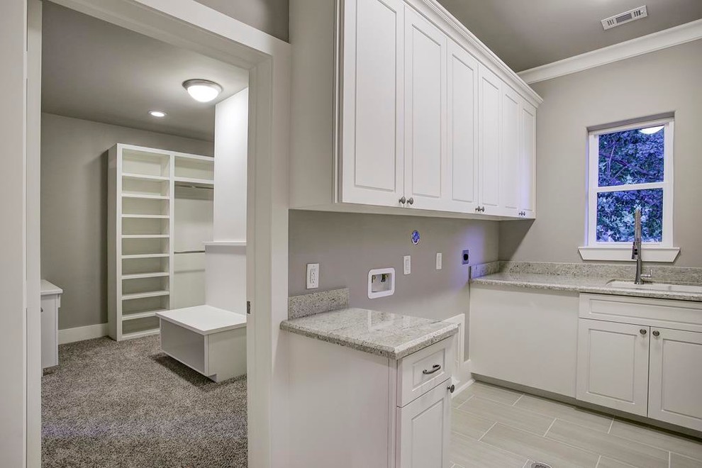 Example of an arts and crafts laundry room design in Houston
