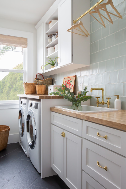 Coastal Vibes: Beach Style Laundry Room with Sea Foam Green Backsplash