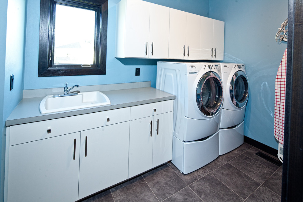 Trendy laundry room photo in Other