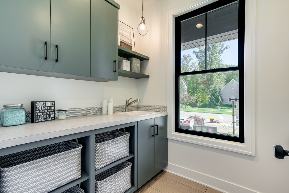 Laundry room - transitional laundry room idea in Grand Rapids