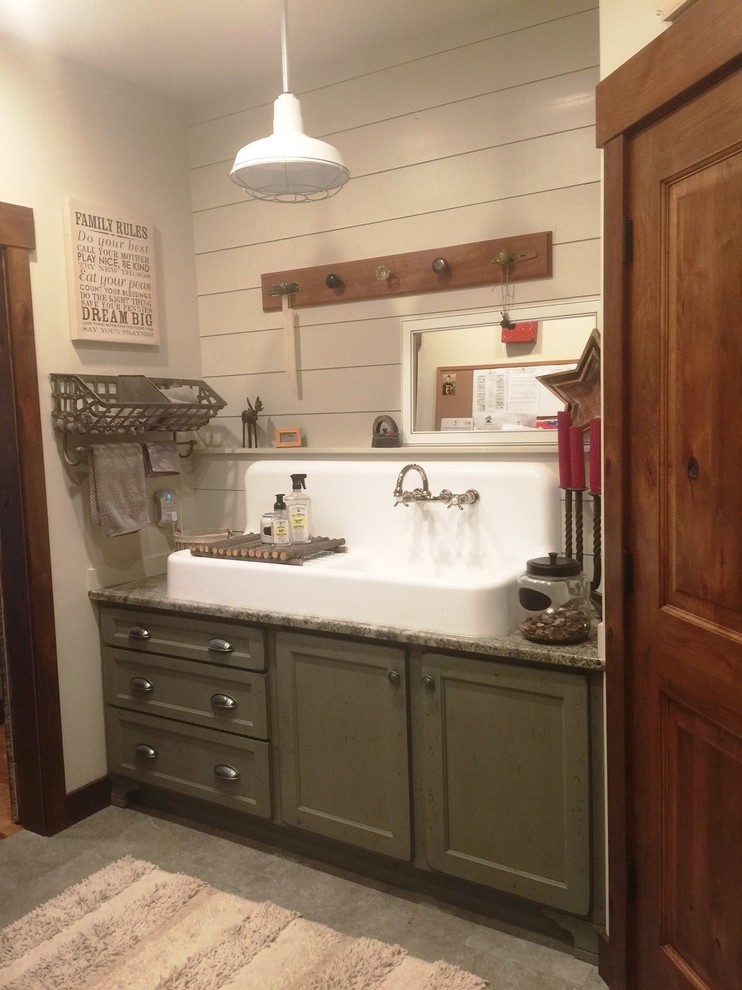 Vintage galley separated utility room in Other with an utility sink, shaker cabinets, distressed cabinets, granite worktops and white walls.