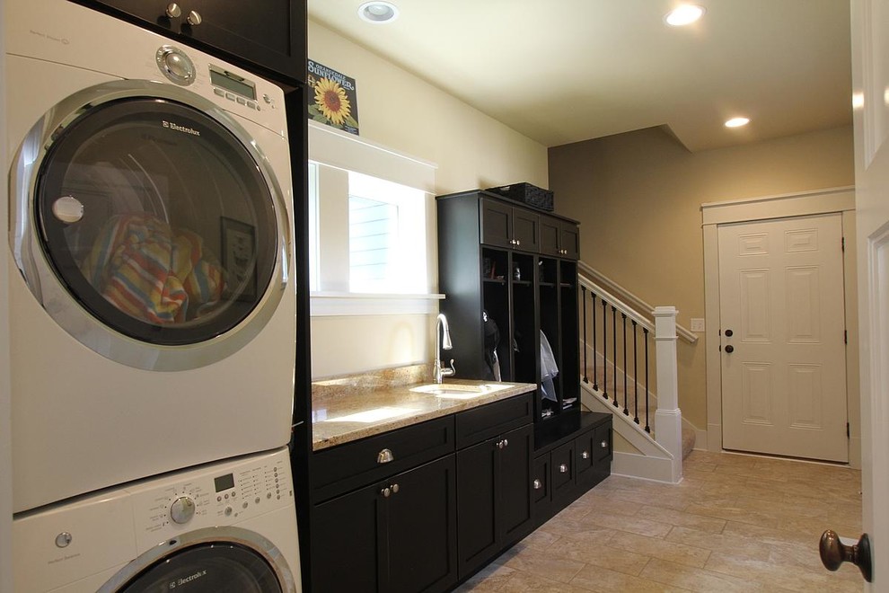 Example of an arts and crafts laundry room design in Cedar Rapids