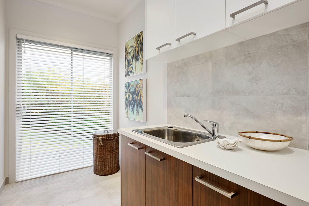 Photo of a beach style utility room in Melbourne.