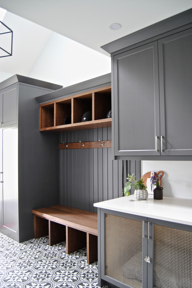 Design ideas for a large traditional galley utility room in Toronto with shaker cabinets, grey cabinets, quartz worktops, white walls, ceramic flooring, multi-coloured floors, white worktops, a vaulted ceiling and tongue and groove walls.