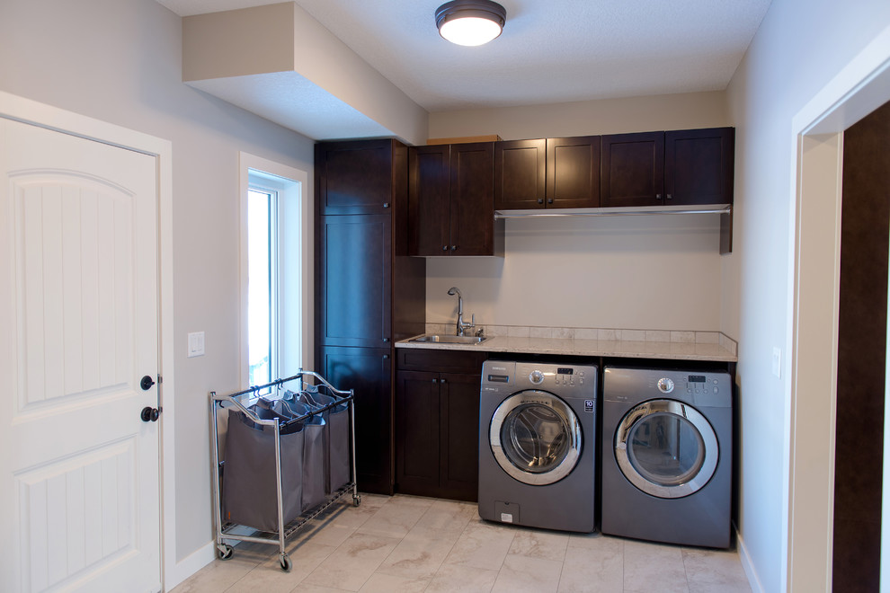 Inspiration for a craftsman laundry room remodel in Calgary