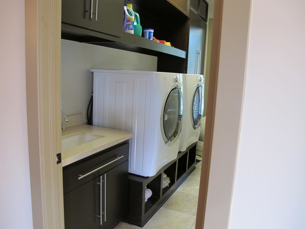 Inspiration for a modern laundry room remodel in Houston