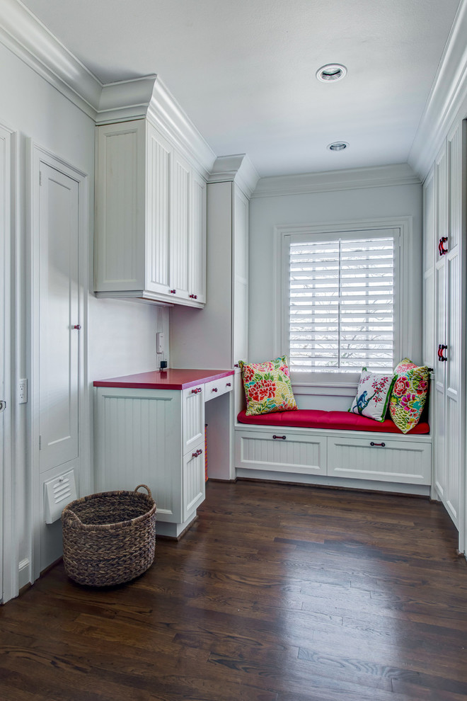 Inspiration for a country u-shaped utility room in Dallas with recessed-panel cabinets, white cabinets, medium hardwood flooring and red worktops.