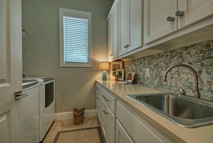 Inspiration for a contemporary laundry room remodel in Austin