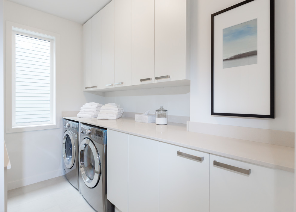 This is an example of a contemporary utility room in Vancouver.