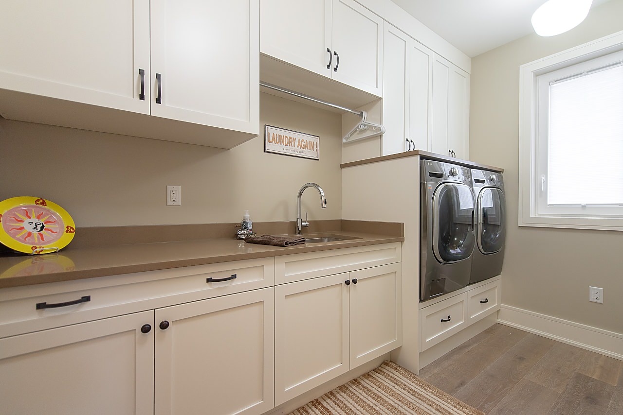 Foto e Idee per Lavanderie - lavanderia american style con parquet chiaro -  Ottobre 2023 | Houzz IT
