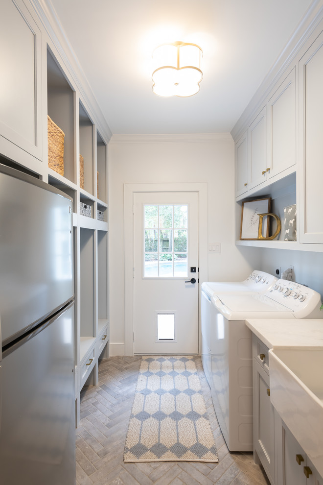 Transitional laundry room photo in Houston