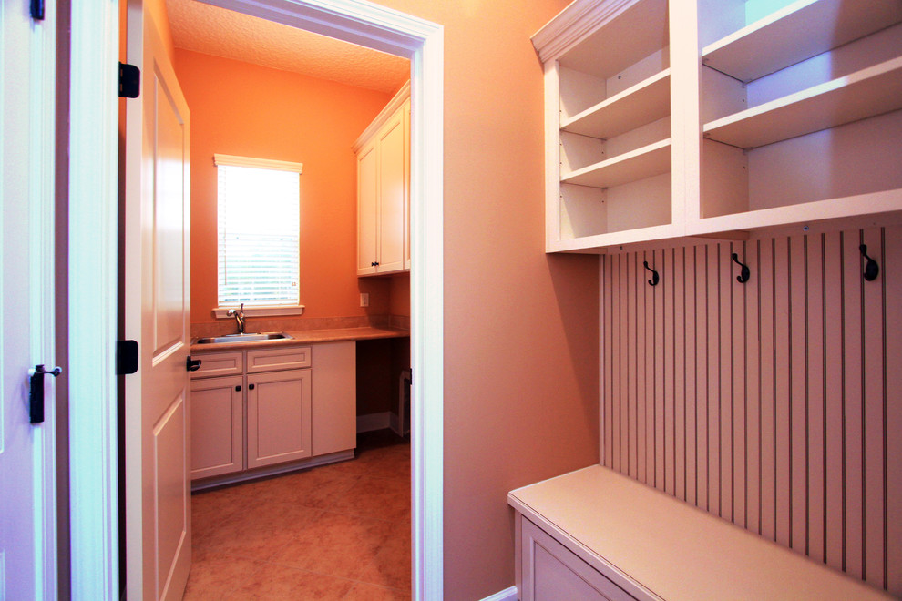 Design ideas for a beach style utility room in Jacksonville.