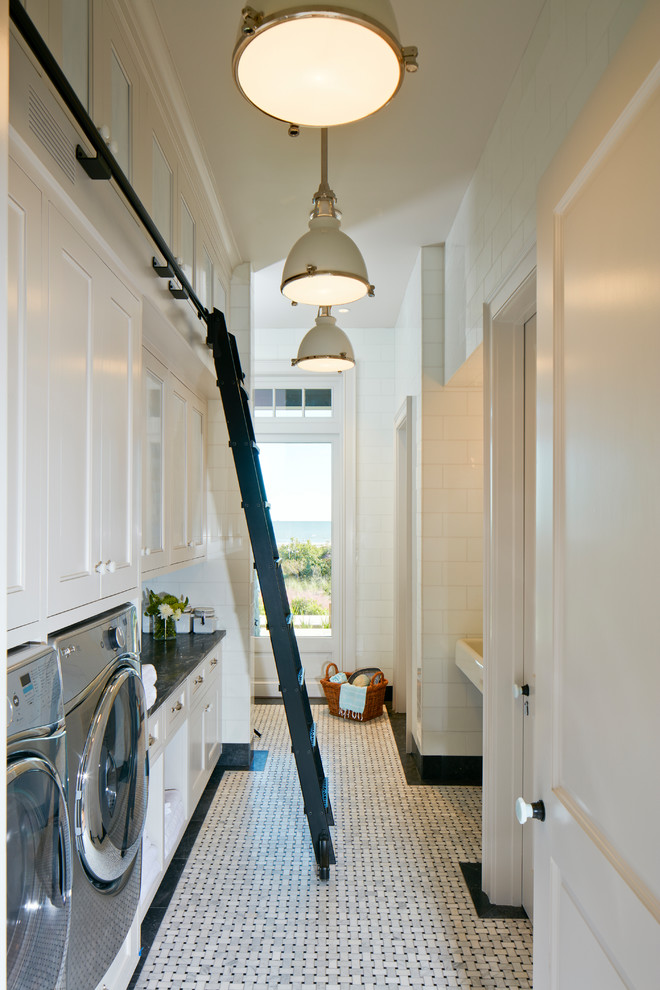 Example of a beach style laundry room design in Charleston