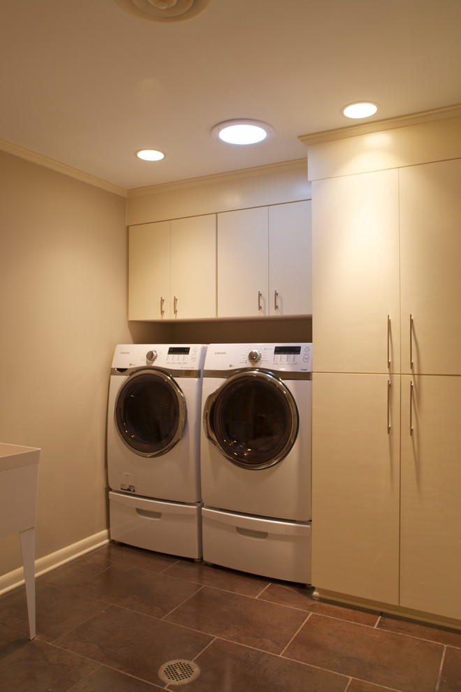 Mid-sized trendy ceramic tile dedicated laundry room photo in Jackson with an utility sink, flat-panel cabinets, white cabinets and beige walls