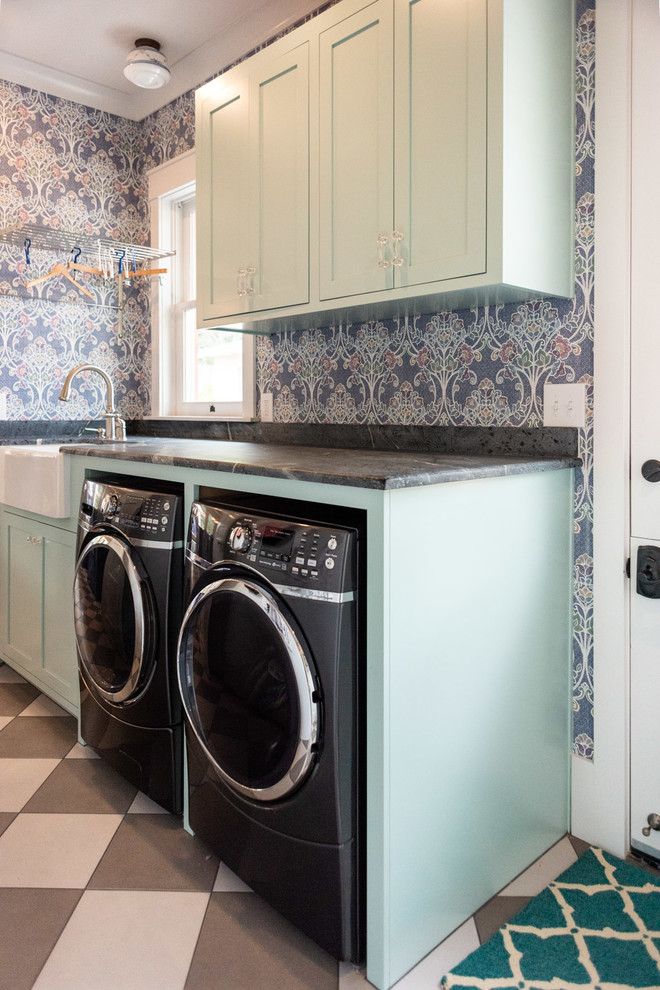 Small eclectic galley separated utility room in San Luis Obispo with a belfast sink, shaker cabinets, turquoise cabinets, multi-coloured walls, porcelain flooring, a side by side washer and dryer, multi-coloured floors and grey worktops.
