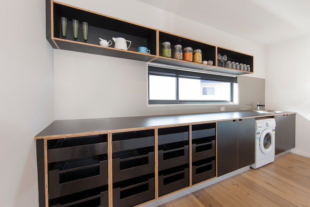 Photo of a modern utility room in Melbourne.