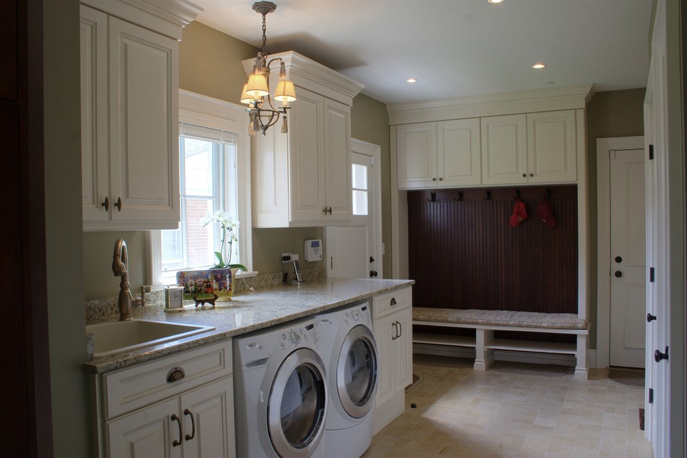 Medium sized traditional single-wall utility room in Chicago with a built-in sink, raised-panel cabinets, white cabinets, granite worktops, beige walls, a side by side washer and dryer, ceramic flooring and beige floors.