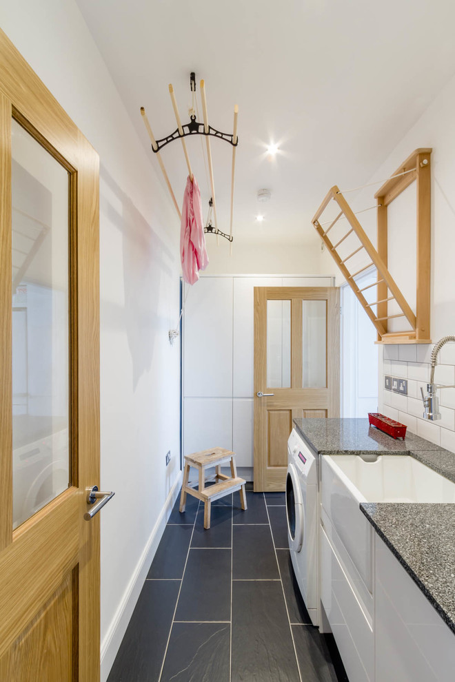This is an example of a contemporary utility room in Glasgow.