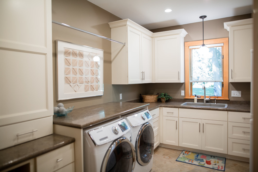 This is an example of a medium sized classic l-shaped separated utility room in Minneapolis with a built-in sink, shaker cabinets, white cabinets, laminate countertops, grey walls, porcelain flooring, a side by side washer and dryer, beige floors and brown worktops.