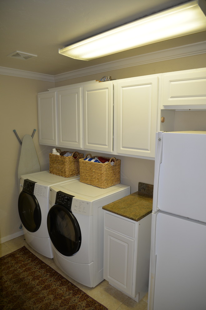 Example of a southwest laundry room design in Austin
