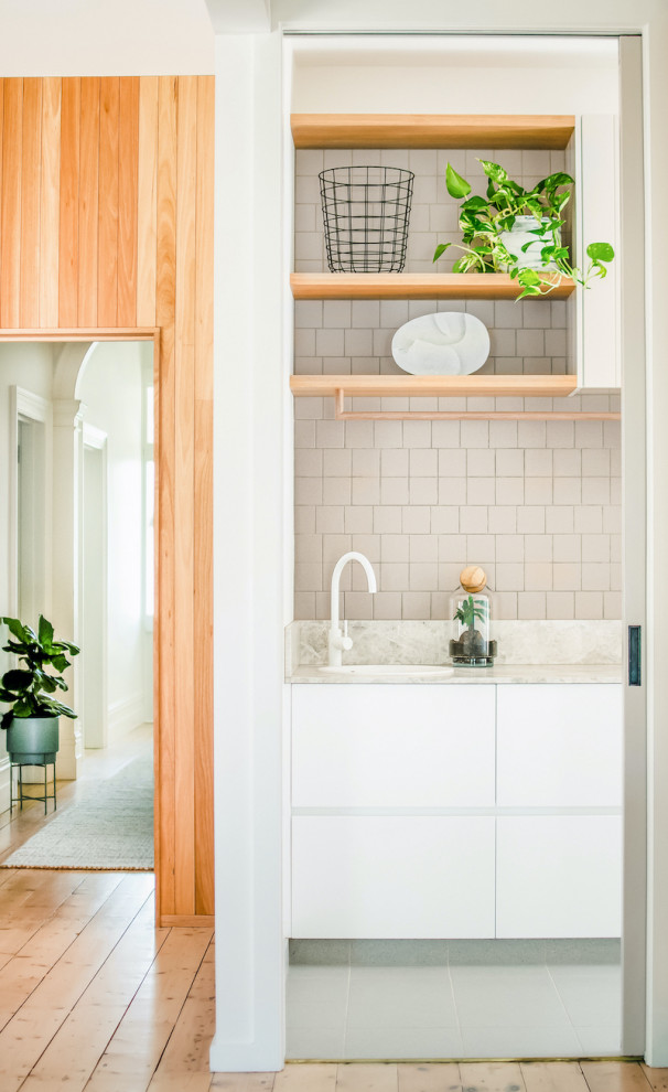 Example of a small danish laundry room design in Melbourne