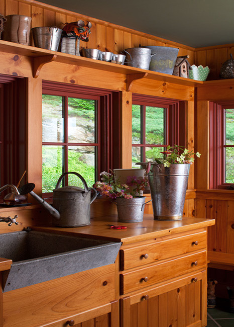 This is an example of a rustic utility room in Boston.