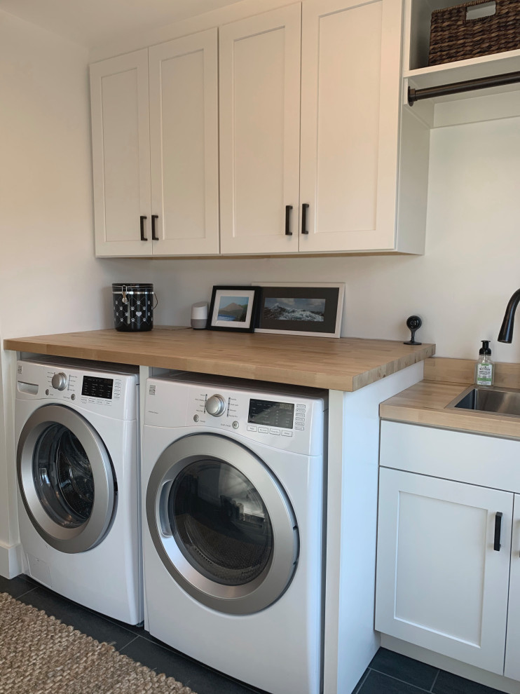 Example of a farmhouse laundry room design in Raleigh