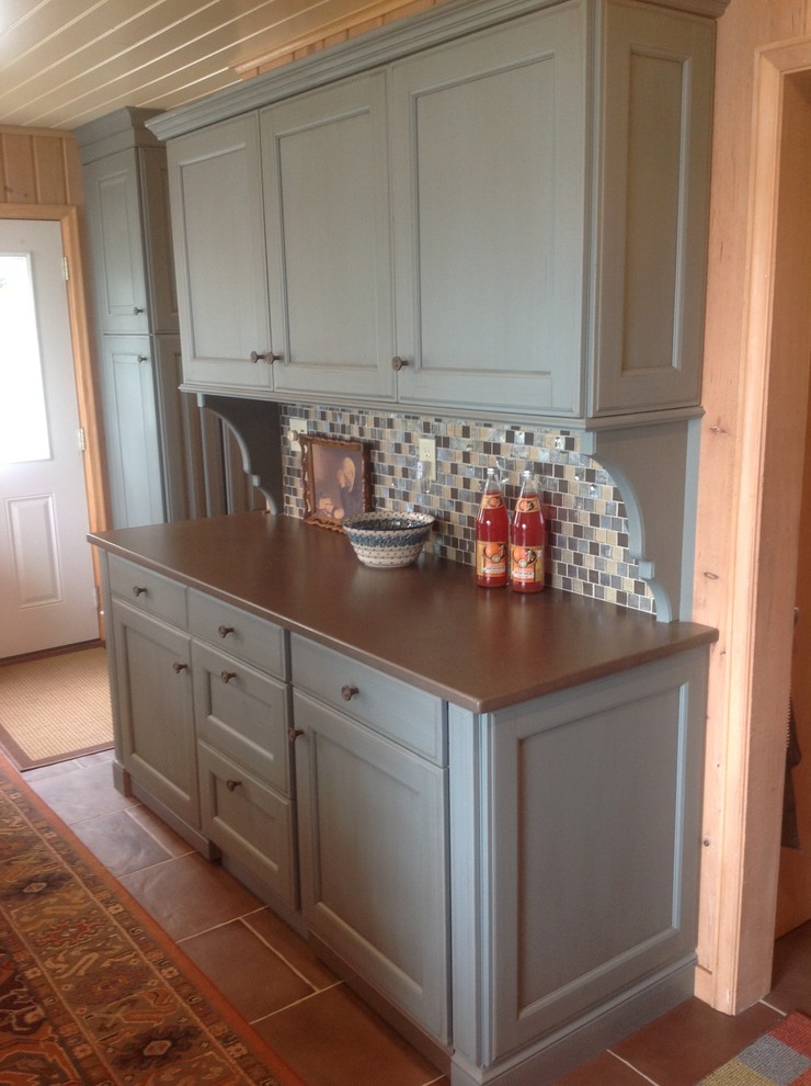 Hutch hiding Asko washer and dryer Traditional Laundry Room Other