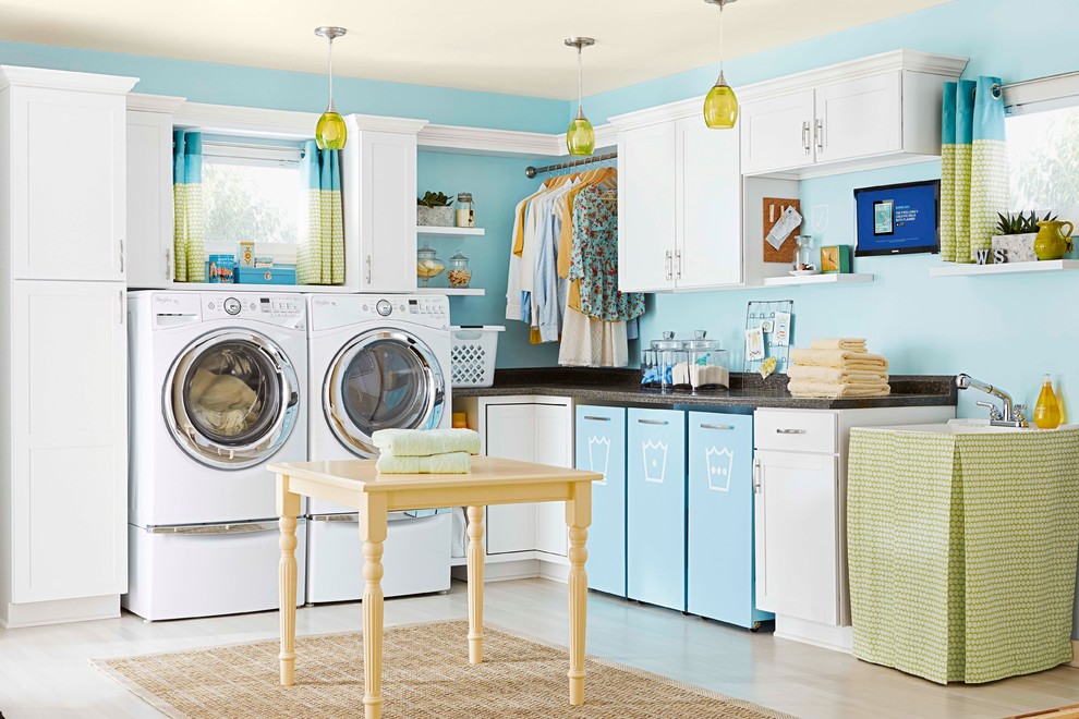 Example of a transitional laundry room design in Charlotte