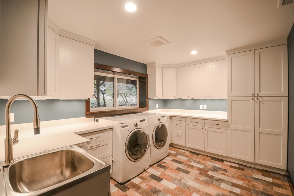 Photo of a traditional utility room in Seattle.