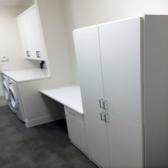Lakeview Laundry + Office room Modern Laundry Room Chicago by