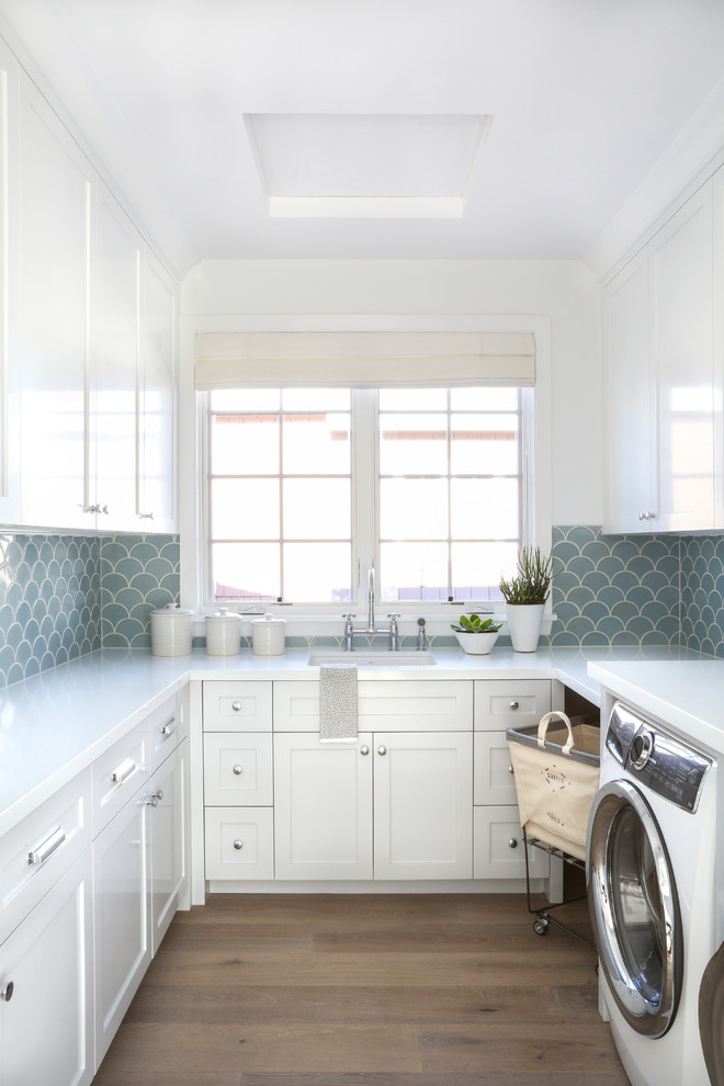 Beach style utility room in Orange County.