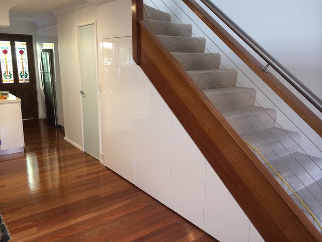 Laundry area under stairs and new ensuite 1. - Modern - Laundry Room