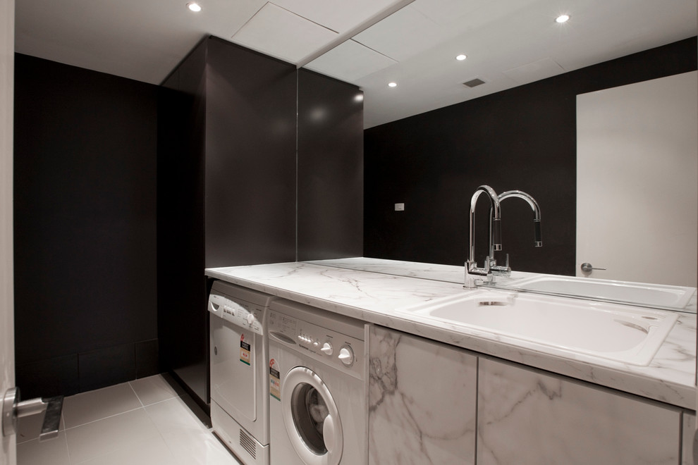 This is an example of a contemporary utility room in Brisbane.