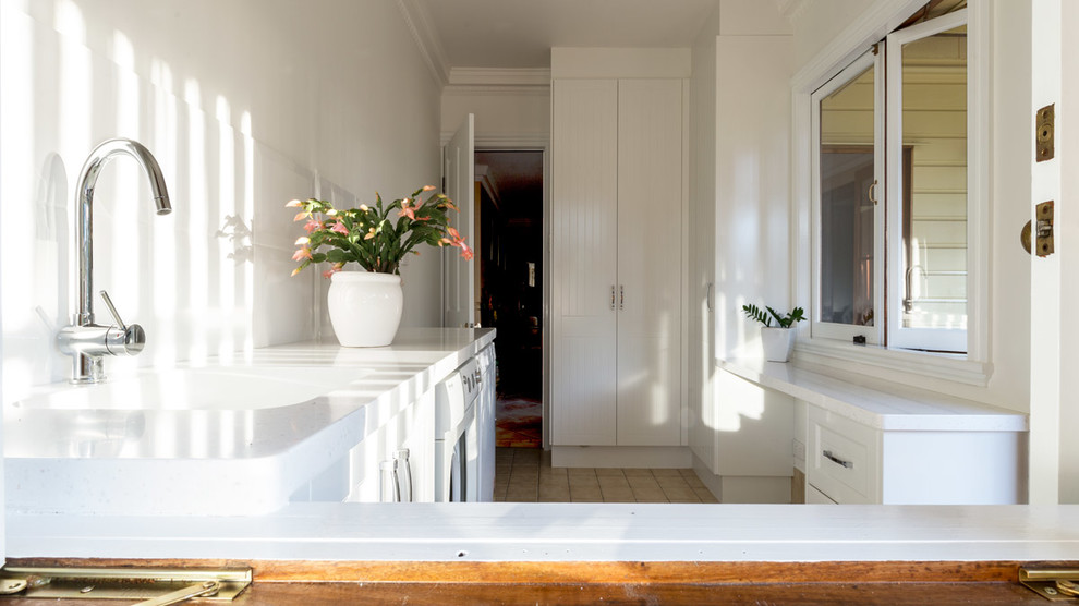 Photo of a traditional utility room in Brisbane.