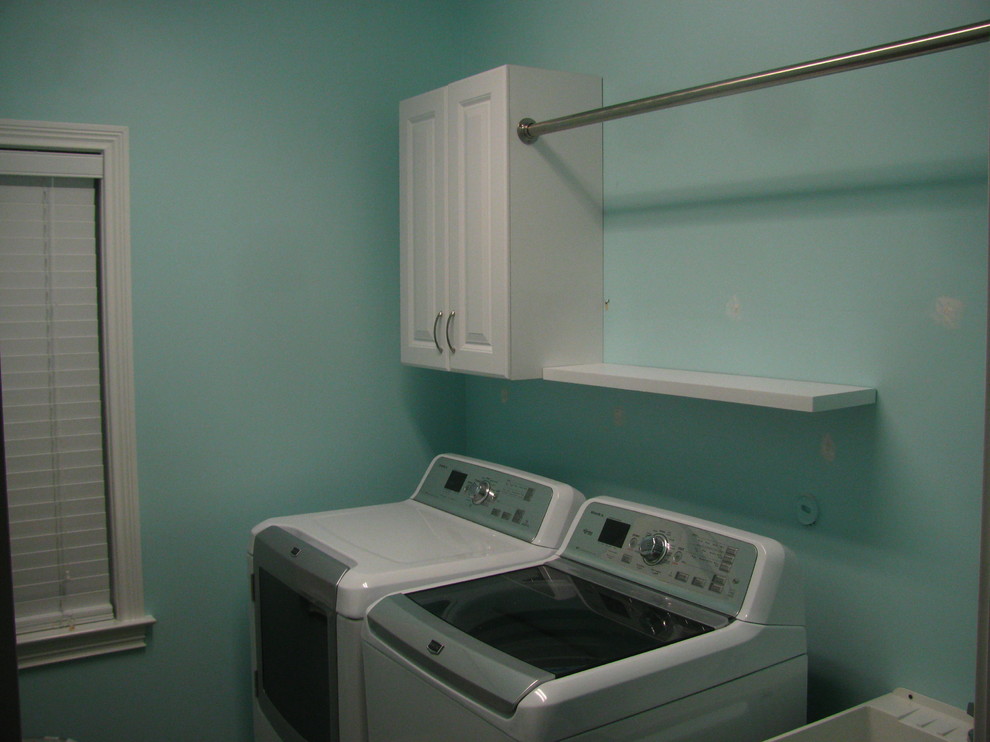 Elegant laundry room photo in Nashville