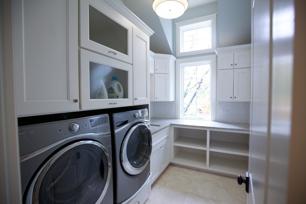 Design ideas for a small country l-shaped separated utility room in Chicago with a built-in sink, shaker cabinets, white cabinets, quartz worktops, grey walls, ceramic flooring, a side by side washer and dryer and beige floors.