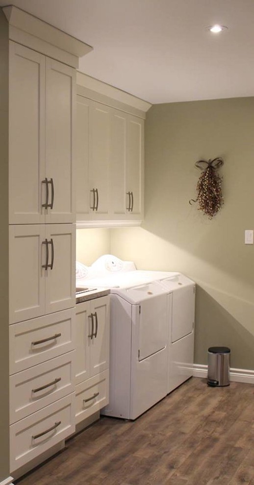 Inspiration for a medium sized contemporary galley utility room in Other with a built-in sink, shaker cabinets, white cabinets, granite worktops, beige walls, dark hardwood flooring and a side by side washer and dryer.