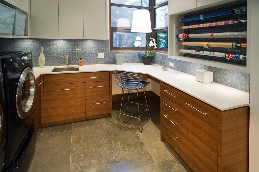 Laundry room - contemporary gray floor laundry room idea in Vancouver with medium tone wood cabinets and white countertops