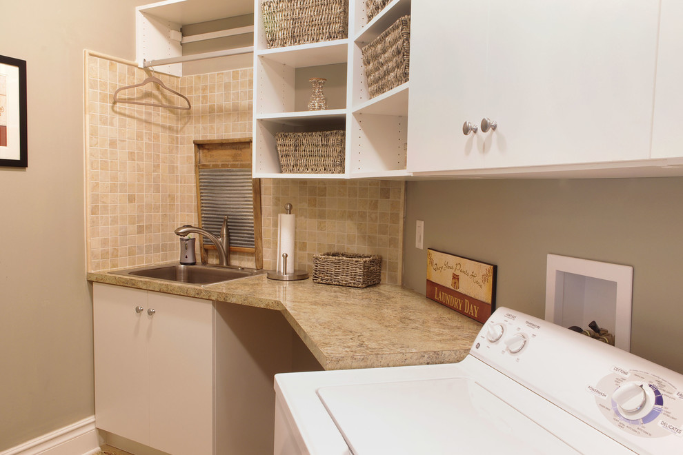 Mid-sized eclectic laundry room photo in New York with flat-panel cabinets, white cabinets, laminate countertops and a side-by-side washer/dryer