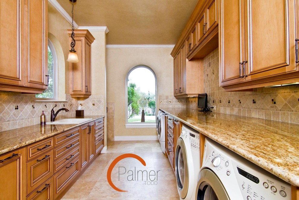 Elegant laundry room photo in Austin