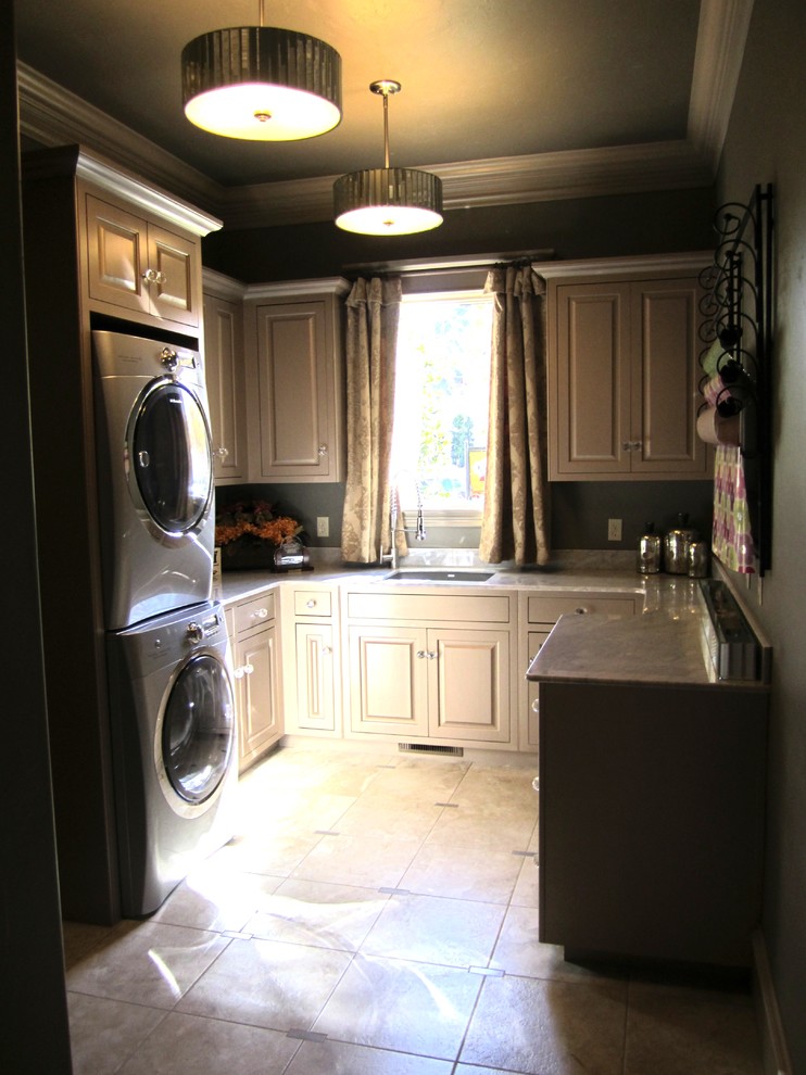 Laundry Room with Stacked Washer/Dryer, Sink and Window Traditional