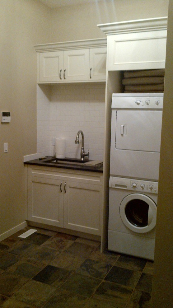 Trendy laundry room photo in Calgary