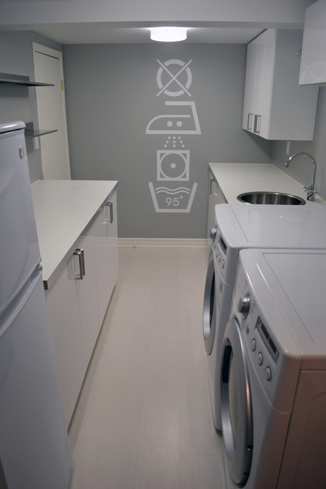 Inspiration for a contemporary laundry room remodel in Ottawa