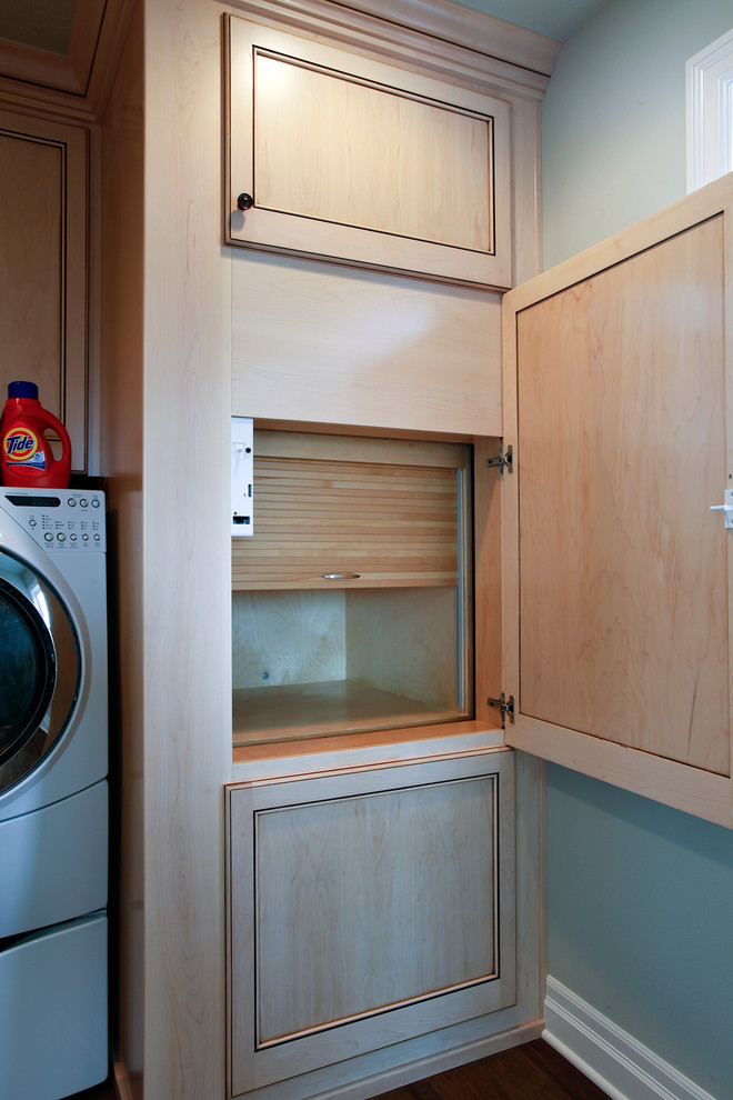 Example of a beach style laundry room design in Portland