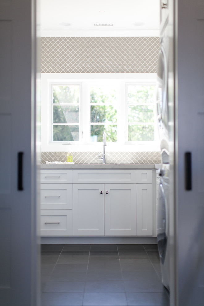 Inspiration for a beach style utility room in Orange County.