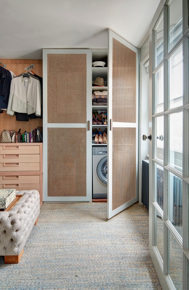 Transitional laundry closet photo in London