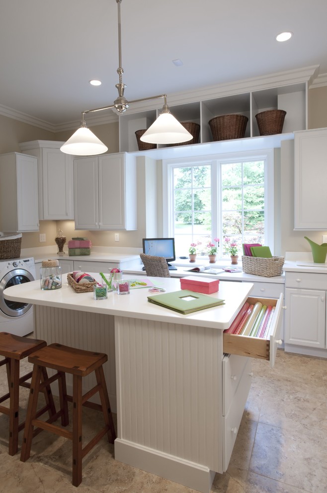 Inspiration for a timeless laundry room remodel in St Louis with white cabinets