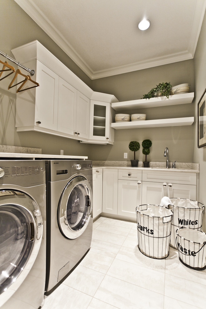 Elegant laundry room photo in Edmonton with gray walls