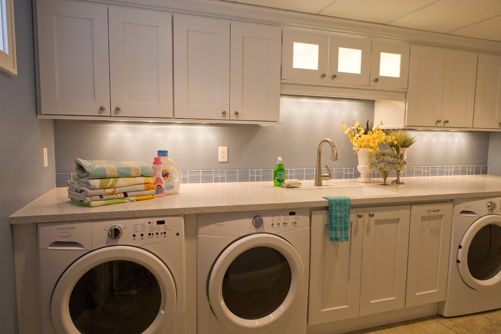 Laundry room - modern laundry room idea in Other